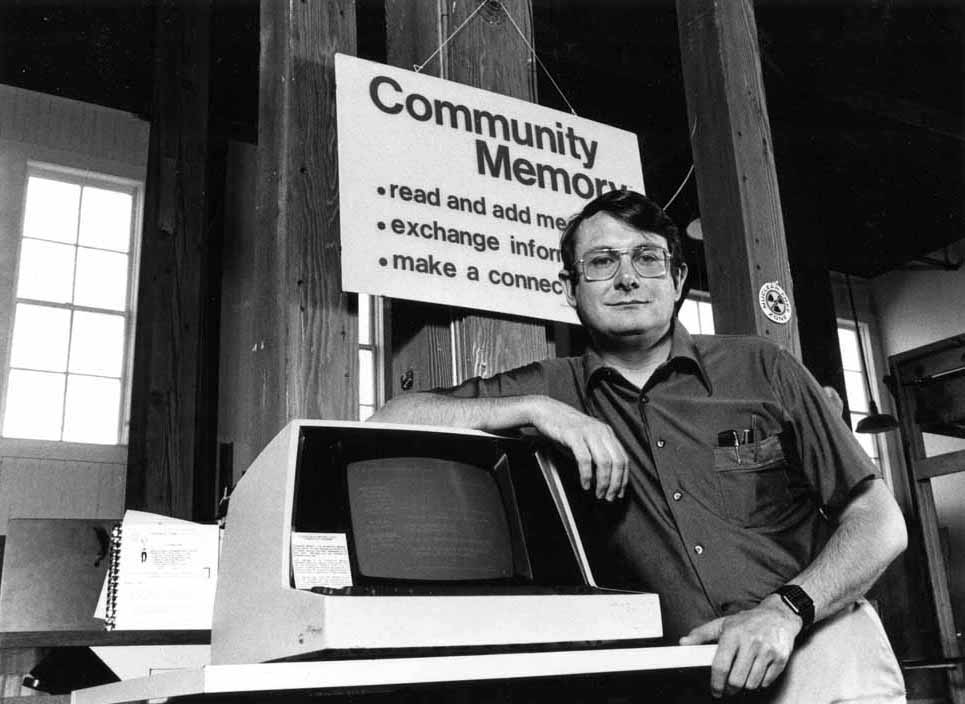 Lee Felsenstein poses with Community Memory. Photo from the Computer History Museum.
