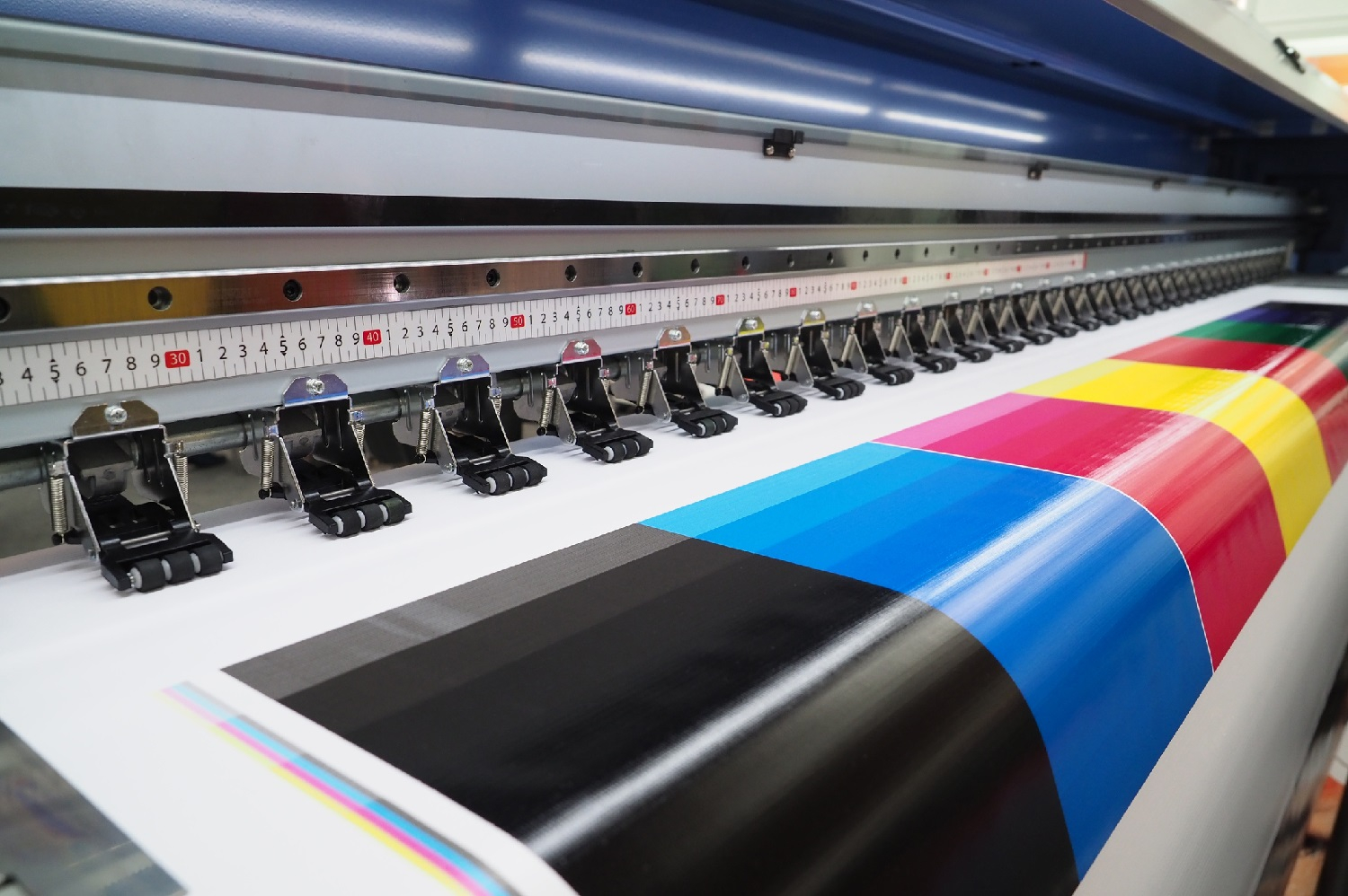 A wide-format printer at work. Image from the Business blog.