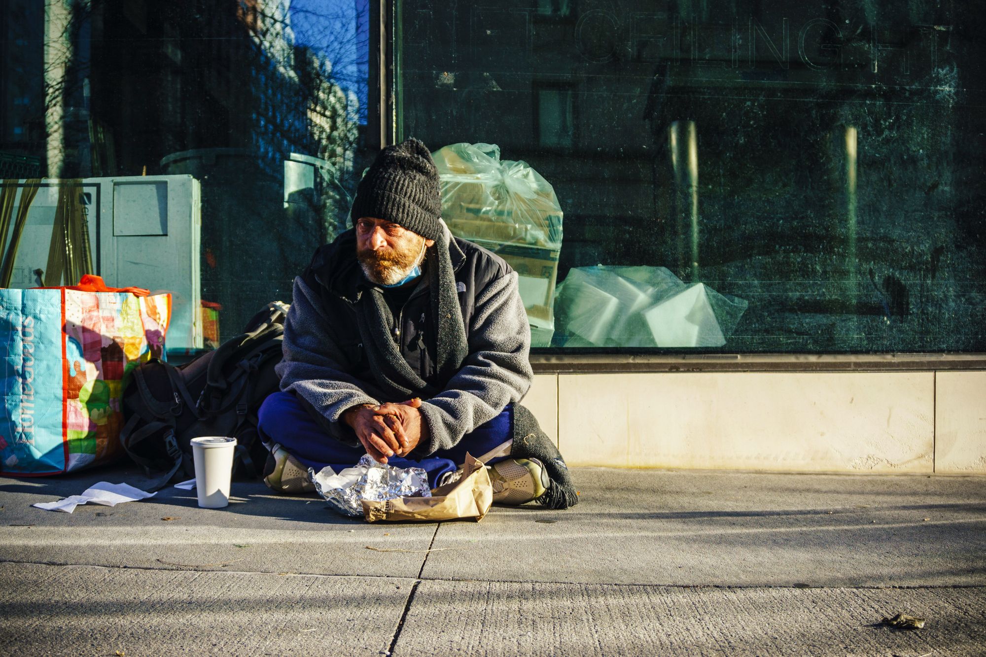 A homeless man at East 67th street & Lexington avenue, NY. Photo by Clay LeConey on Unsplash