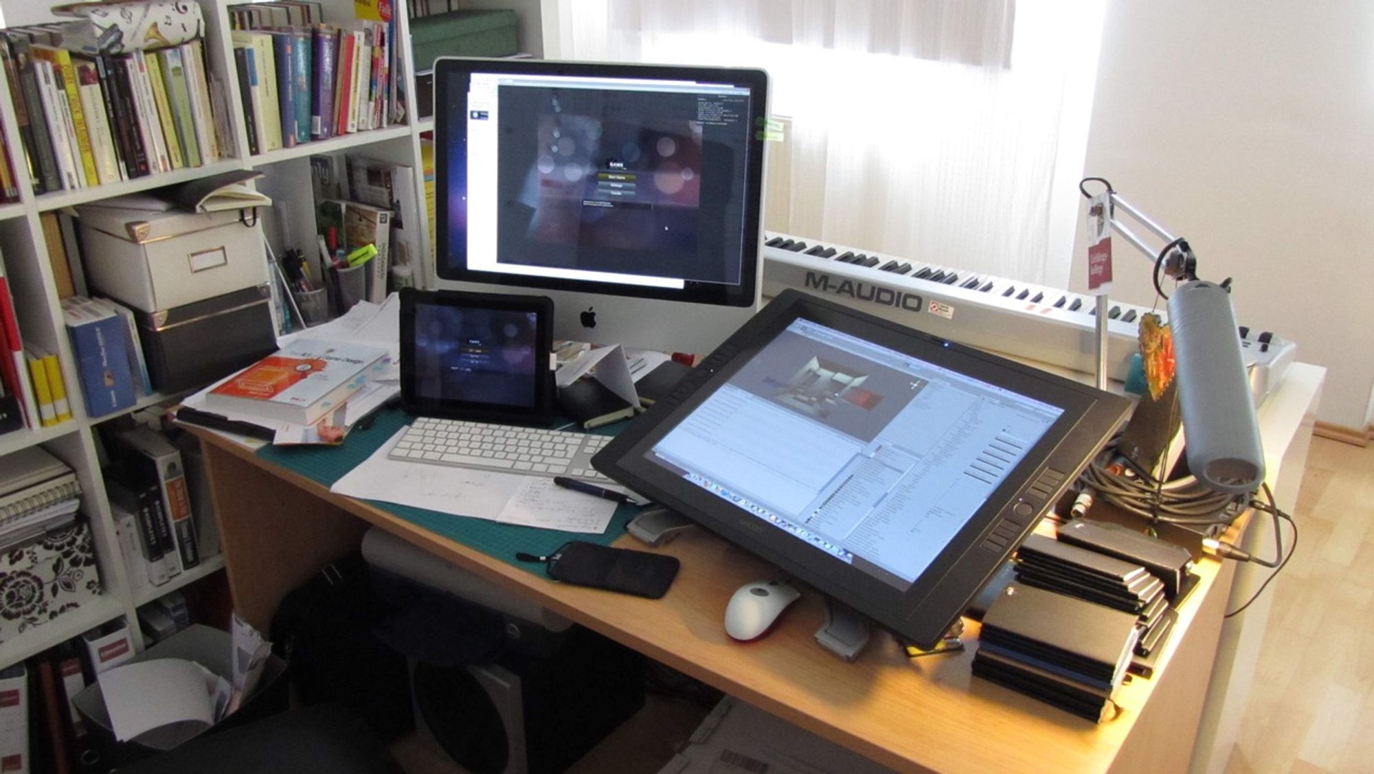 My home-office desk sometime in 2010. There I was, happily making my own games in Unity. Sigh.