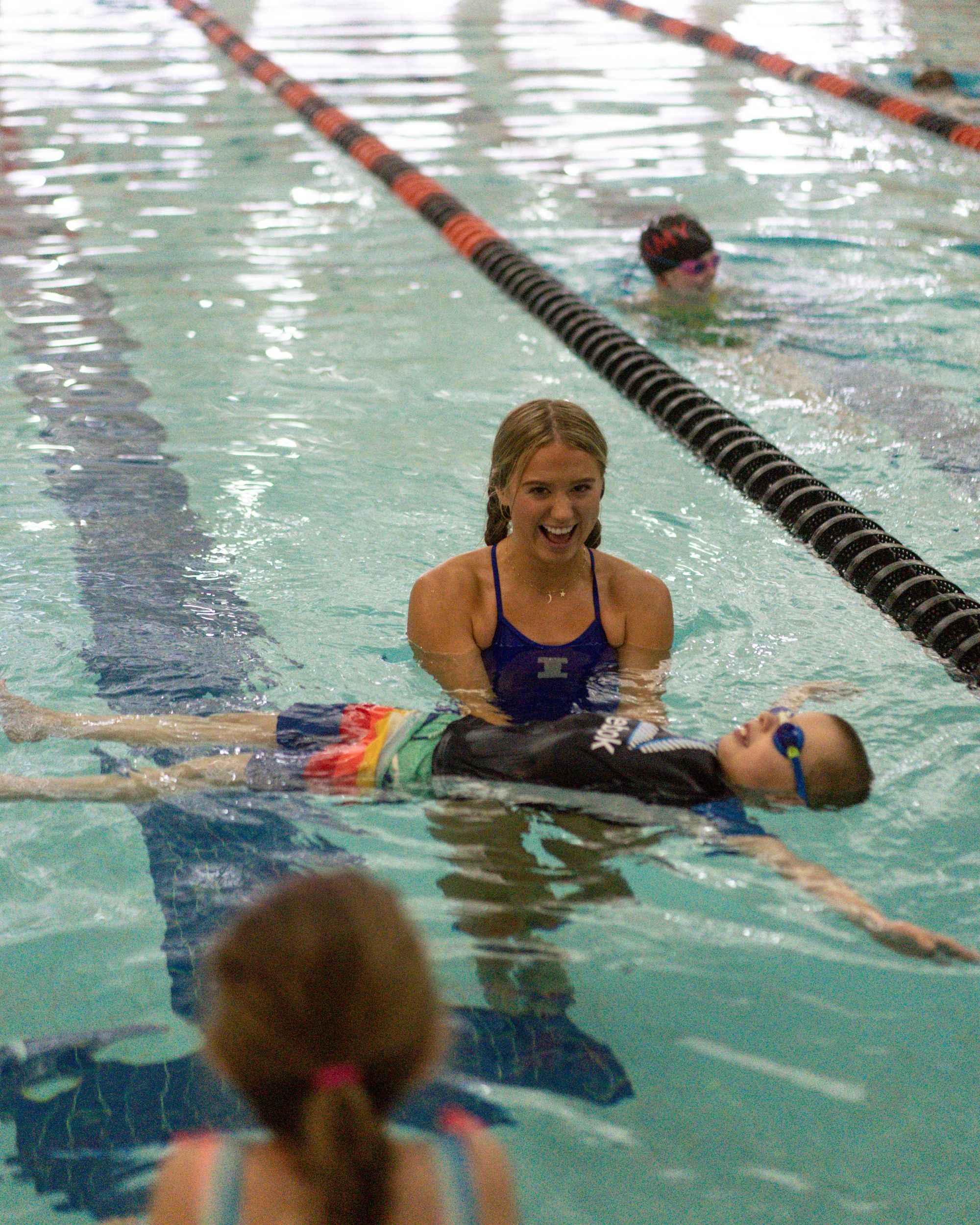 Learning to float at our swim clinic!