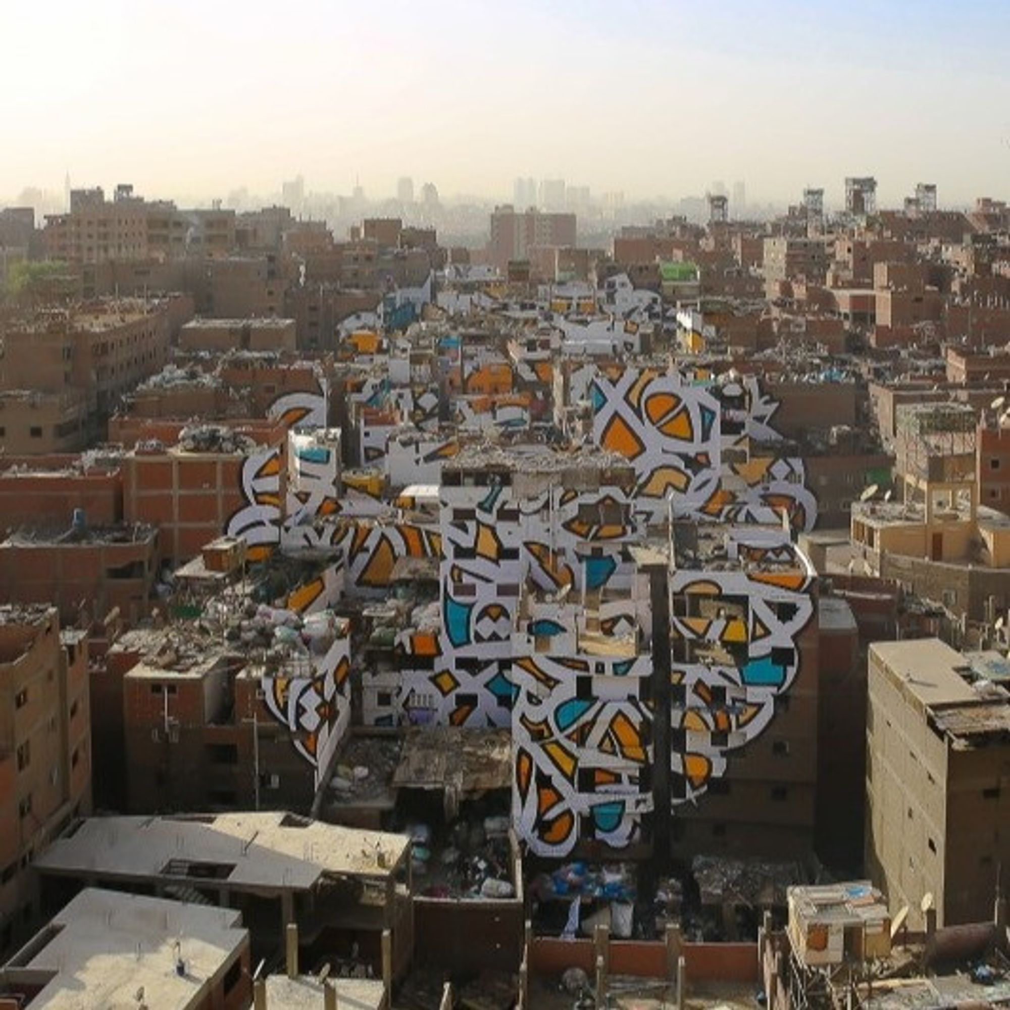eL Seed - Le Caire, 2016  https://elseed-art.com/projects/perception-cairo/