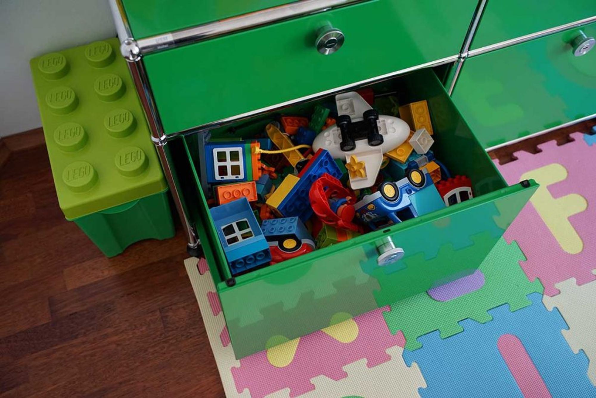 A USM cabinet is used to store colorful LEGO blocks. Image courtesy: USM Switzerland.