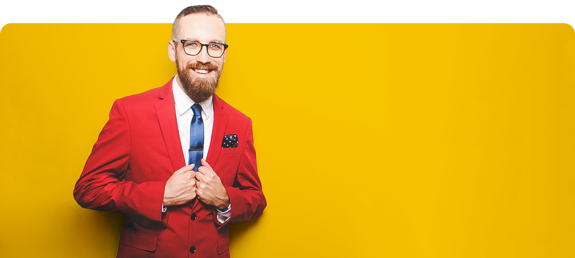 Profile photo of Nick Frühling in a red jacket on a yellow backdrop
