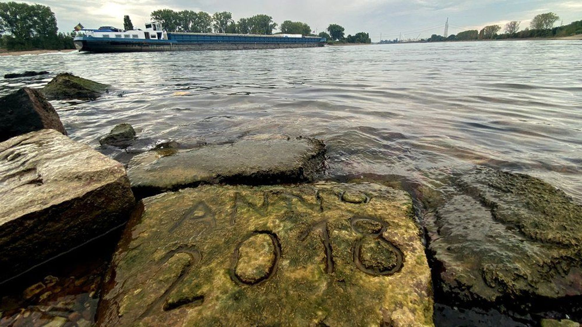 In pictures: Drought in Europe exposes sunken ships, lost villages and ominous 'hunger stones' - BBC News