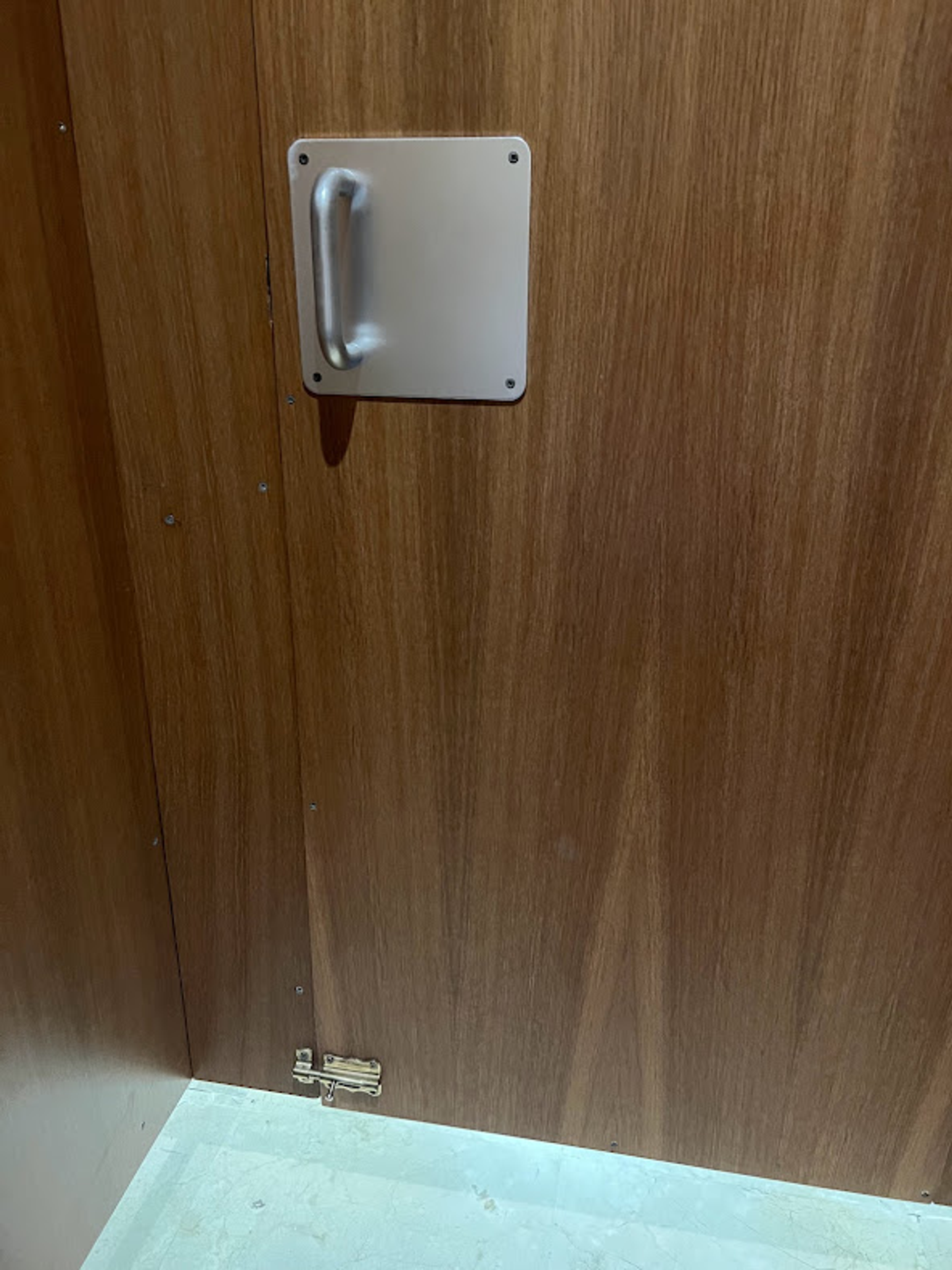 The bathroom’s lock was at the bottom of the door, very unique.